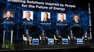 Speakers and attendees during Opening General Session
