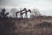 Two old pumpjacks, sometimes called a grasshopper oil pump somewhere in Texas