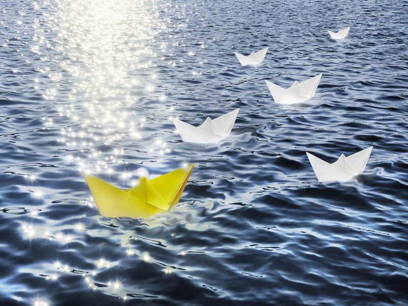 Paper boats on water