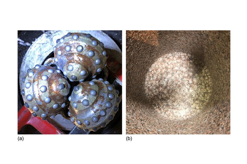 Fig. 1—A tricone bit (a) and a rock sample (b) after drilling with a tricone bit. No visible fractures were observed at the bit/rock interface in any test.