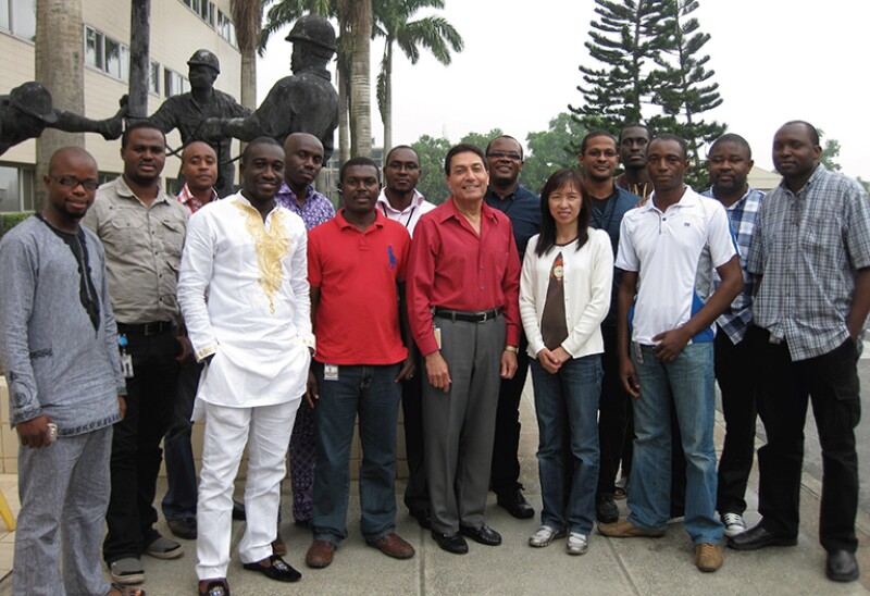 Chevron colleagues shown with Kamal after a meeting in Lekki, Nigeria, in July 2011.