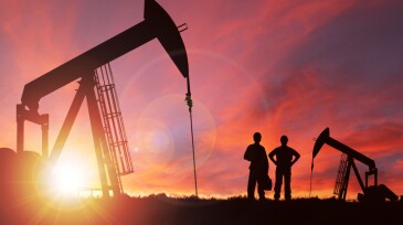Sunset Over Pumpjack Silhouette With Copy Space