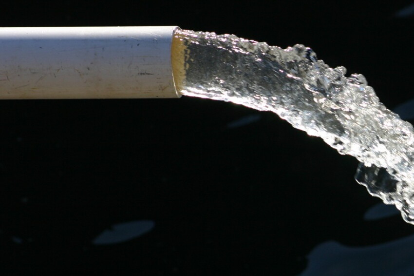 Close-up of water pipe with pouring water