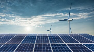 Solar panels and nature background at sunrise