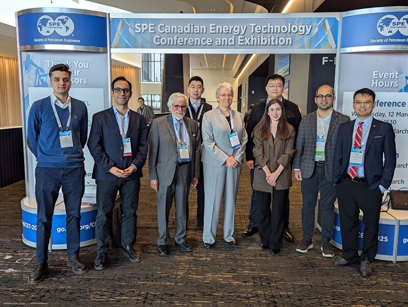 Miskimins with Professor Roberto Aguilera and his University of Calgary students at the SPE Canadian Energy Technology Conference and Exhibition.