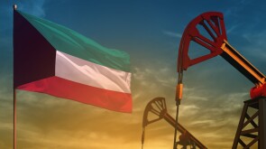 Kuwait oil industry concept. Industrial illustration - Kuwait flag and oil wells against the blue and yellow sunset sky background - 3D illustration