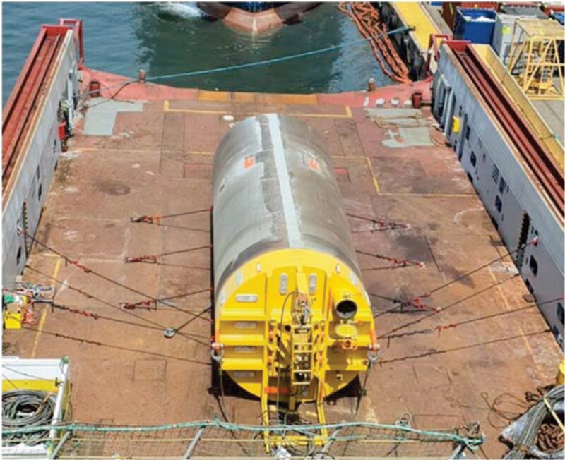 suction pile anchor after being loaded onto a supply vessel