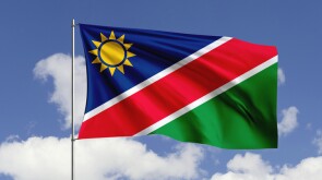 Namibia flag fluttering in the wind on sky.
