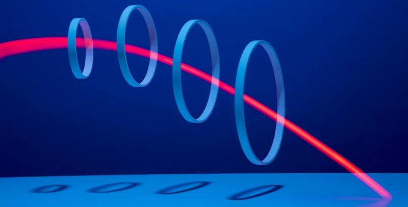 Red light streaking through 4 hoops