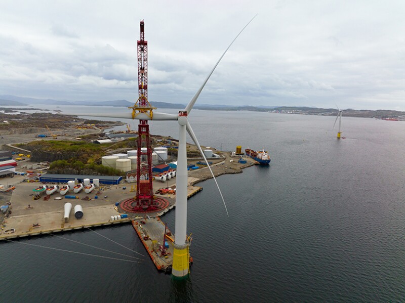 The installation of blades on the second Hywind Tampen turbine at an assembly site in Gulen, Norway.