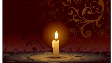 Single candle on background with scrolls