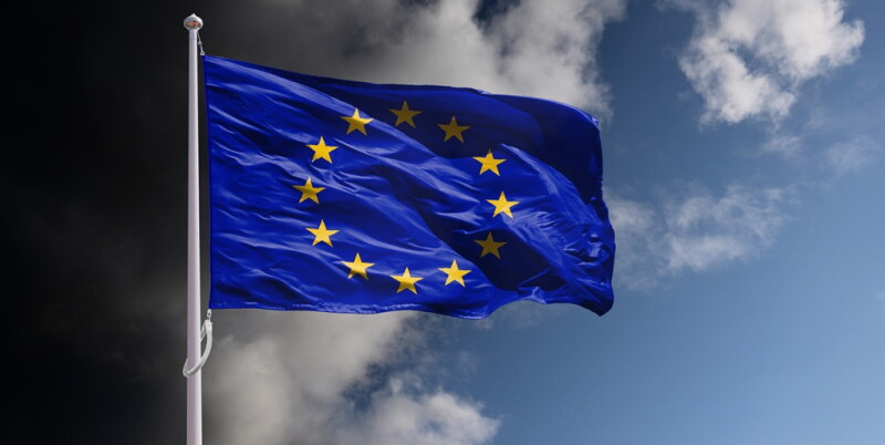 EU flag above dark sky