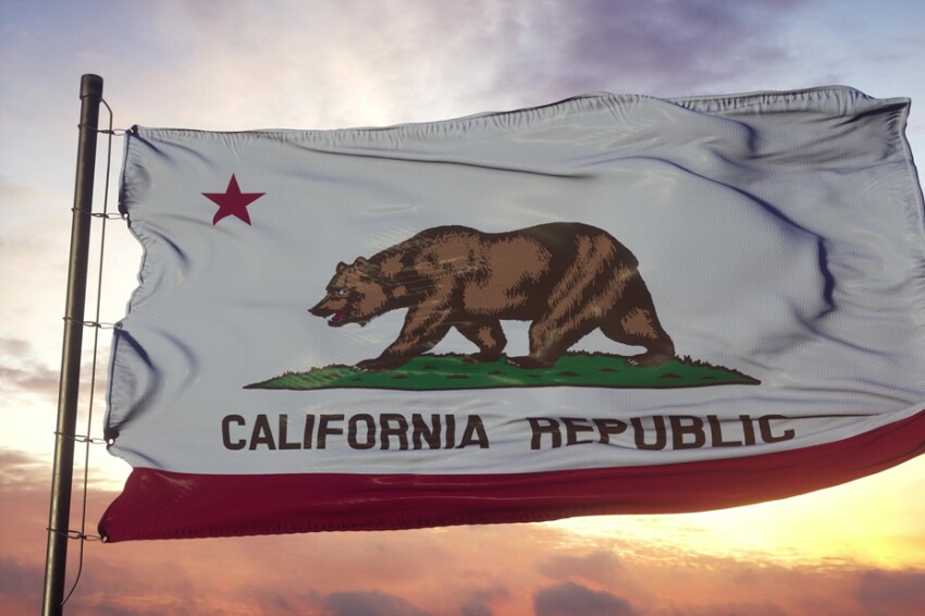 Flag of California waving in the wind against deep beautiful sky. 3d illustration