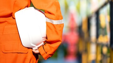 Oil field operator is ready to work - Industrail concept photo.