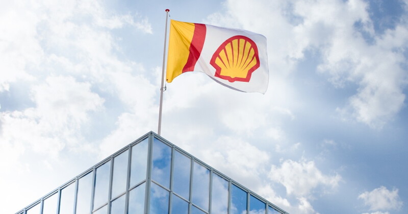 Shell flag over building.