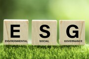 words ESG on a wood block and Future environmental conservation and sustainable ESG modernization development by using the technology of renewable resources to reduce pollution and carbon emission.