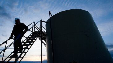 ogf-2014-12-pfcr-man-on-storage-tank-dusk-anadarko.jpg