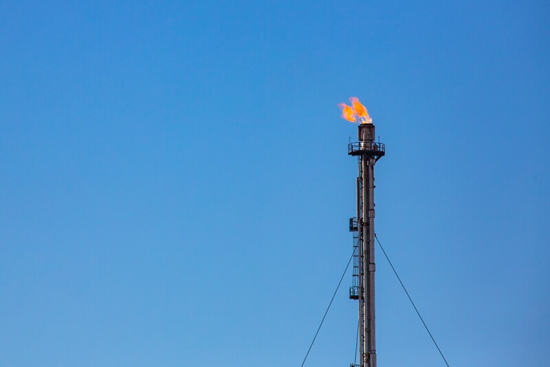 Refinery flare - Burning of dangerous gases in the oil field.