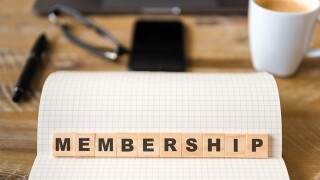 Wooden blocks with letters making Membership text