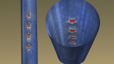 A line of perforations along the top of the casing imaged after fracturing using ultrasound.