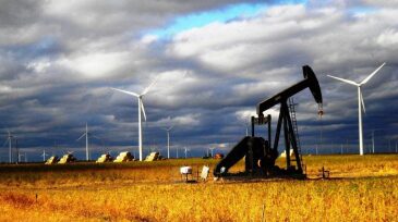 jpt-2016-10-wind-turbines-oil-field.jpg