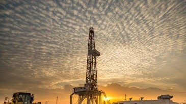 Drilling rig at sunset