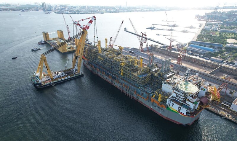 The final topsides module being lifted onto the One Guyana FPSO in June 2024 for the fourth Guyana project, Yellowtail. 40,000 tons from three fabrication yards across China and Singapore were installed on this FPSO, which will have a production capacity of 250,000 BOPD. Source: ExxonMobil.