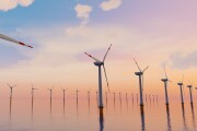 3D Rendering of Giant wind turbines farm located in the open sea, sunset shot. Concept of renewal energy using windmills