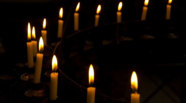 Curved row of candles