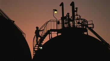 Climbing Ladder on Chemical Tank