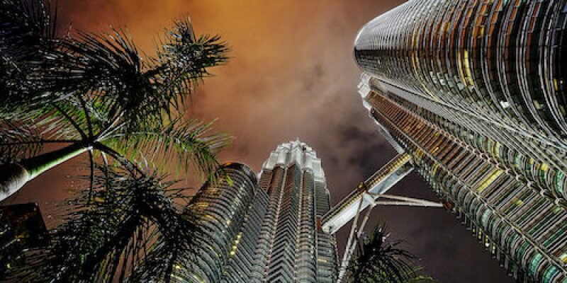 Looking up at Petronas towers from the ground