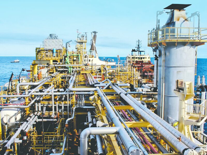 image of a processing facility with piping