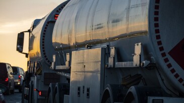 Tanker truck on highway at dusk