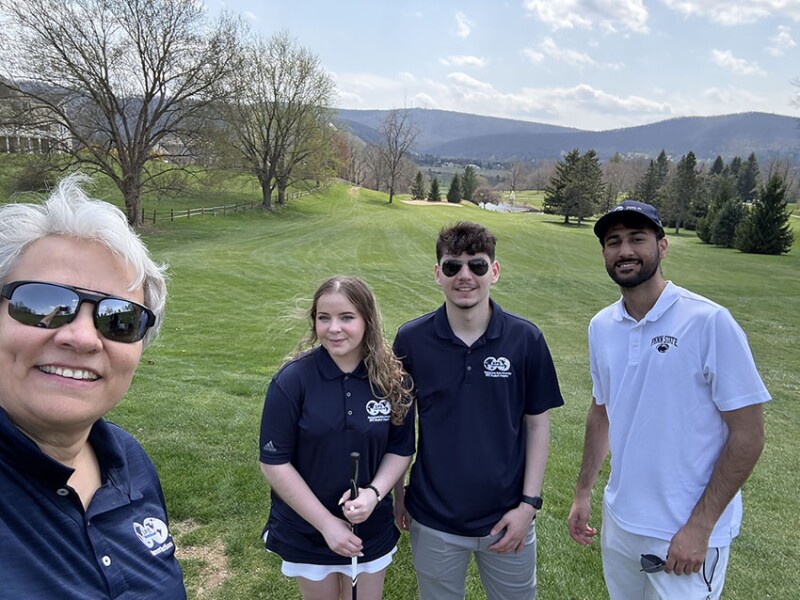 Playing in the Penn State University golf tournament with SPE student section officers.