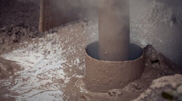 Drilling rig hitting water in the borehole