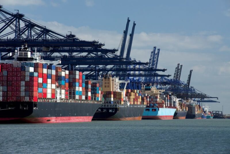 Barges and ships being loaded in port