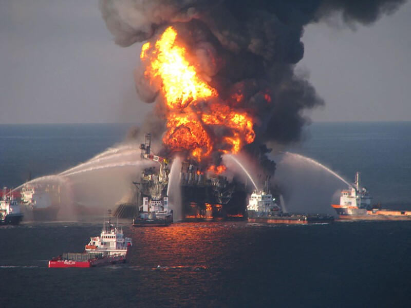 Fire-fighting ships spray water on the burning Deepwater Horizon rig in the Gulf of Mexico after a catastrophic blowout in 2010.