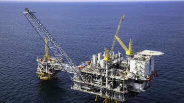 Offshore oil rig in a large body of water