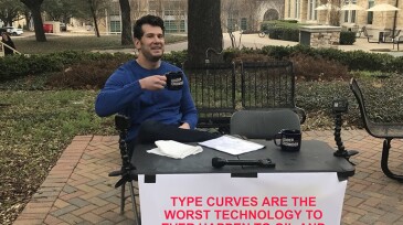 Change My Mind sign at table with man drinking coffee