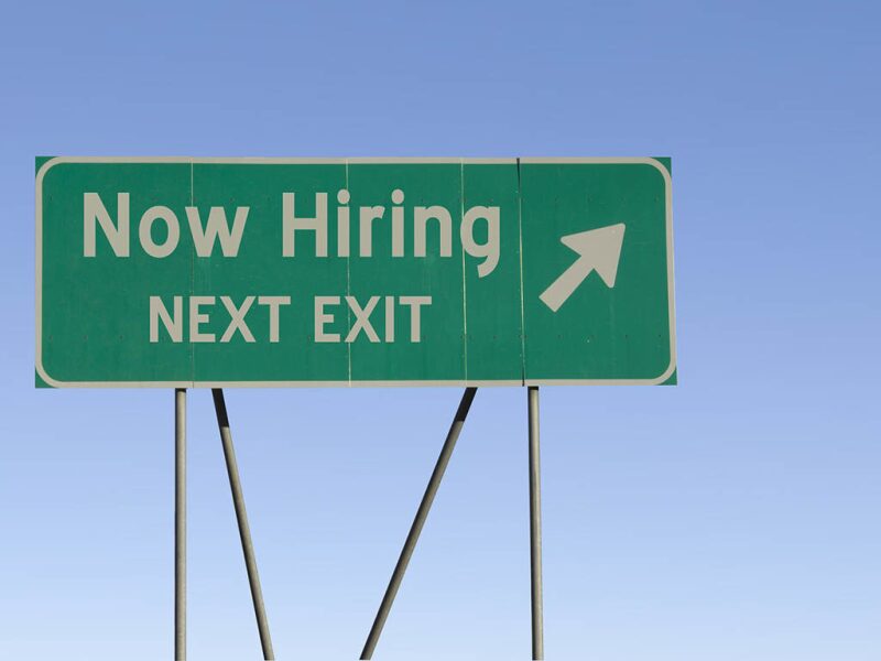 Now Hiring Next Exit sign