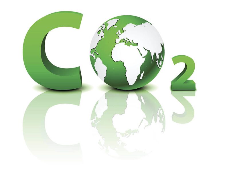 Letters CO2 where the O is represented by a globe