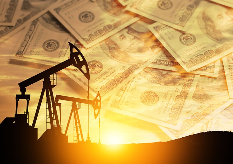 Oil price cap concept. Petroleum, petrodollar and crude oil concept. Oil pump on background of US dollars. Dollars and oil pumps