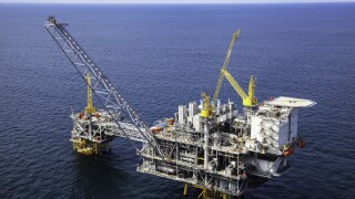 Offshore oil rig in a large body of water