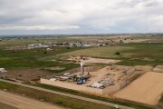 Aerial Drone Clip of a Fracking Drill Rig On The Eastern Slope Of Colorado In Late Springtime