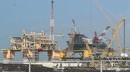 Independence Hub and the near-complete Vito FPU sit side-by-side at Kiewit Offshore Services in Ingleside, TX