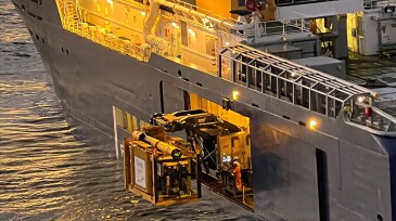 A dedicated launch and recovery system prepares to launch Oceaneering’s Liberty short-term resident system from a vessel in the North Sea. Source: Oceaneering.