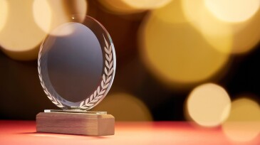 crystal trophy against black background