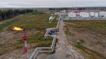 Oil and gas reserves in storage in Europe. The drone flies around oil tanks and a gas flare that burns excess gas. Fuel crisis and a sharp increase in fuel and gas prices in Europe and in the world.