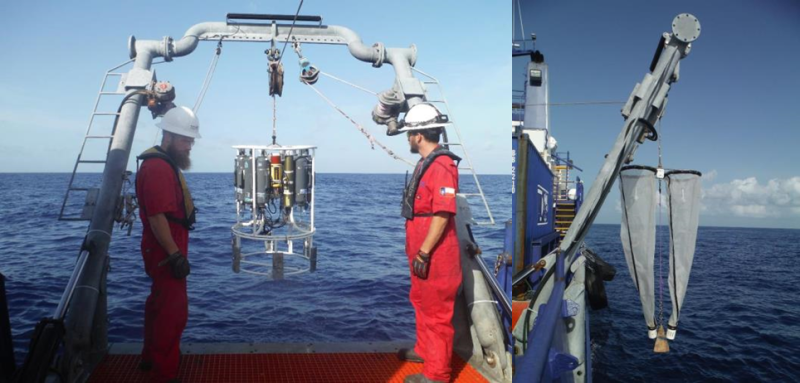 Workers watching as survey equipment is lowered into the water