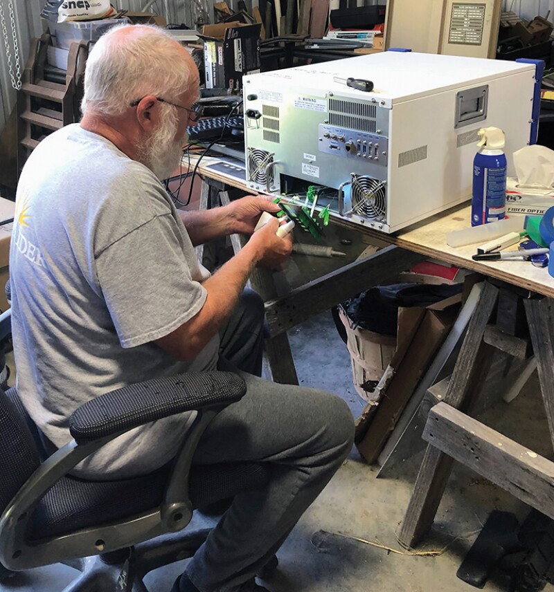 Maintaining an interrogator unit used to measure fiber-optic data.